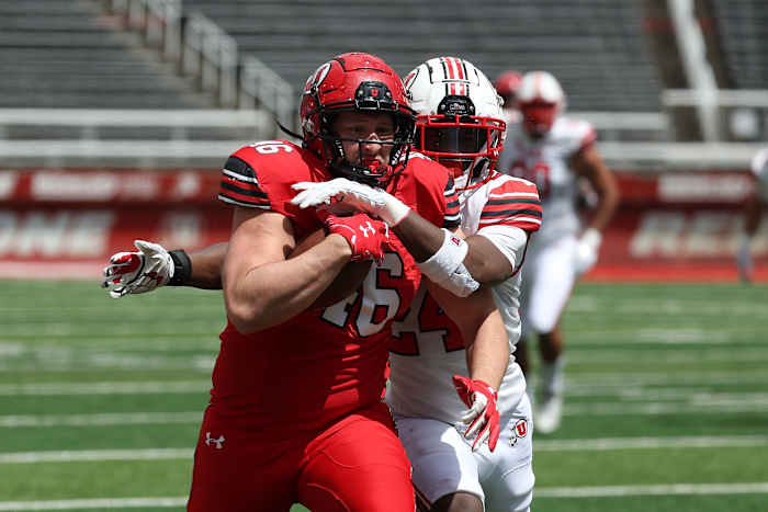 Apr 23, 2022; Salt Lake City, Utah, USA; Utah Utes redshirt freshman tight end Hayden Erickson (46) runs with the ball after a catch against \"Utah Utes redshirt freshman safety Darrien \"\"Bleu\"\" Stewart (24) in the second half at Rice Eccles Stadium. Mandatory Credit: Rob Gray-USA TODAY Sports